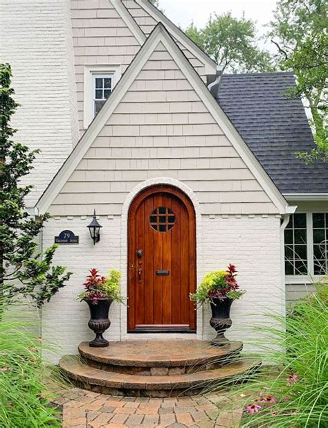 tudor exterior makeover|exterior tudor front doors.